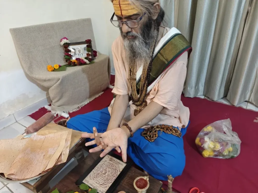 Shri Damodar Dasji Maharaj Activating  the Power of a Yantra through  Authentic Parampara at YantraChants.com